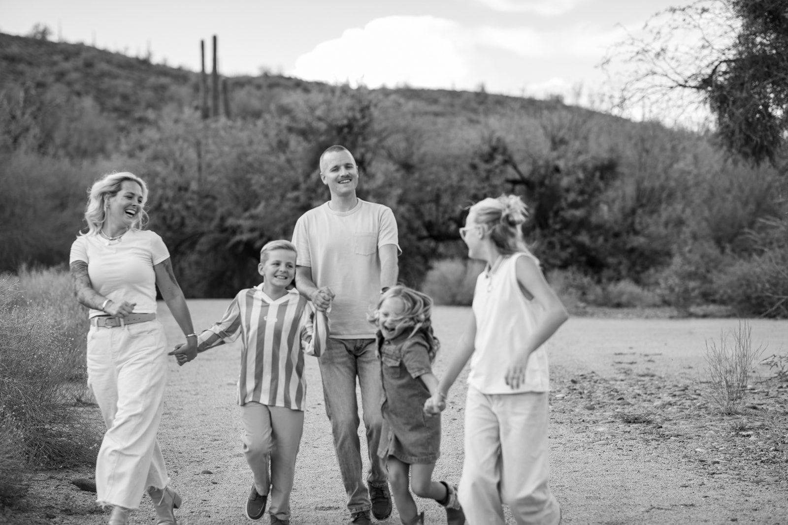 Family laughing together outdoors
